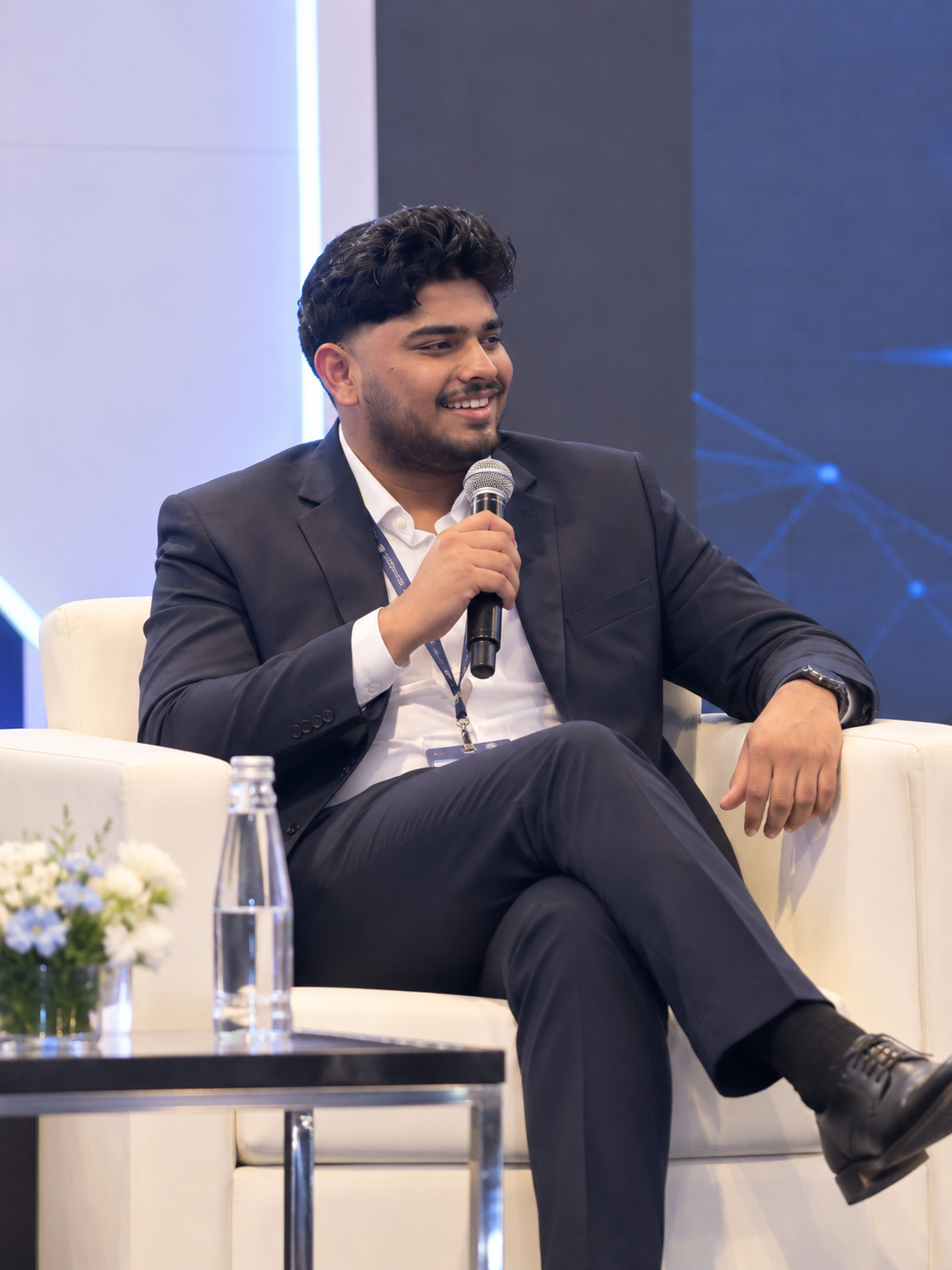 Anurudh Sivakumar, Co-Founder of CLO2π, speaking on stage.